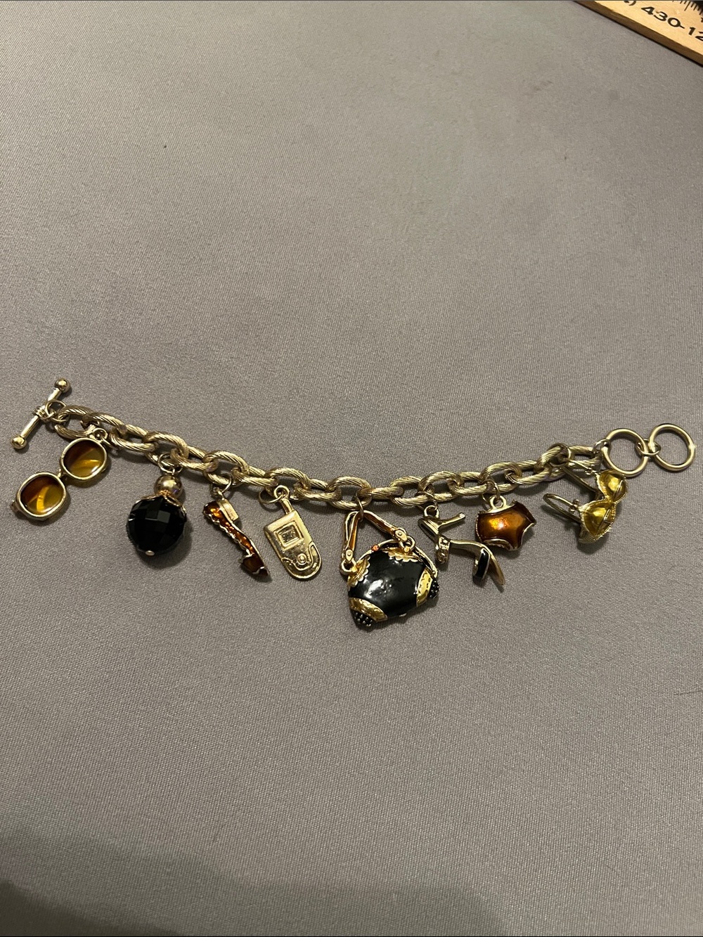Darling gold tone toggle girly charm bracelet, good condition